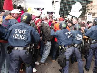 Michigan State Police manhandling protesters.